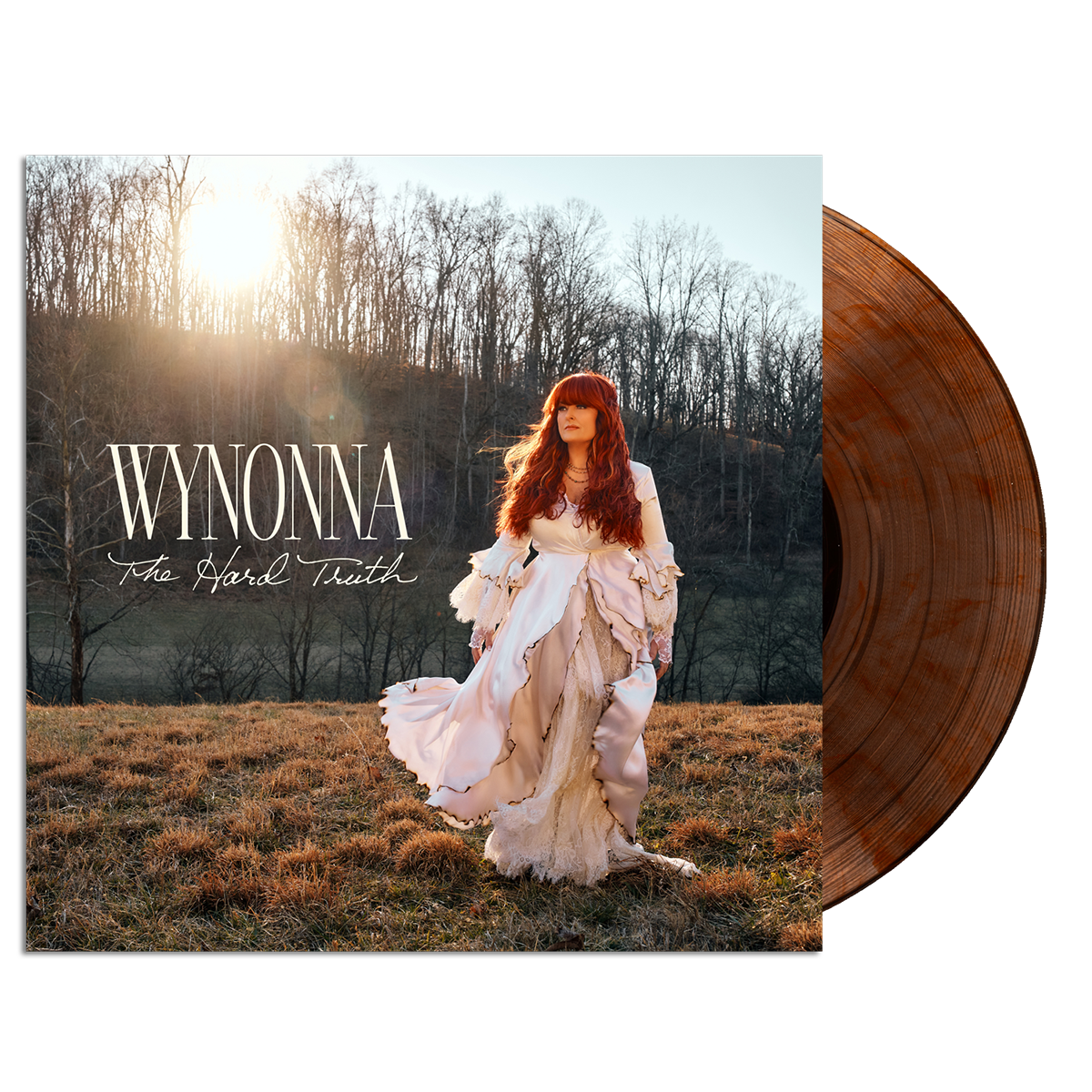Vinyl record with a cover featuring a woman in a field and the text 'Wynonna The Hard Truth'.