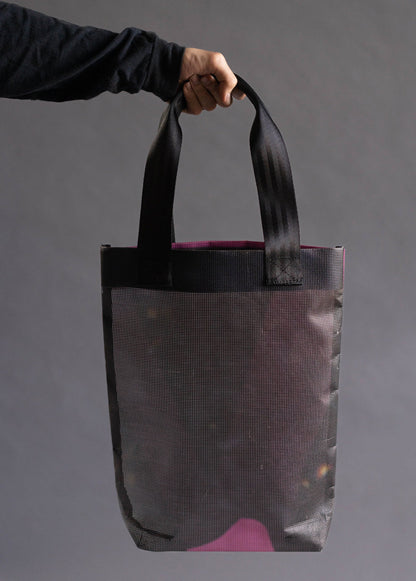 Tote bag, showing its back. No text or graphics are displayed on this particular view
