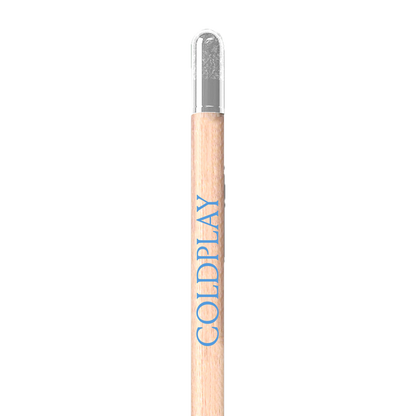Close up of 1 wooden pencil: COLDPLAY is printed in light blue along its length. It has a natural light brown wood color, and a clear capsule attached to its end, which contains the seeds. These capsules are cylindrical and made of thin biodegradable material that would feel different to the touch compared to the texture of the wood. The attachment is designed to keep the capsule in place until the pencil is used up, and the seeds can be planted.