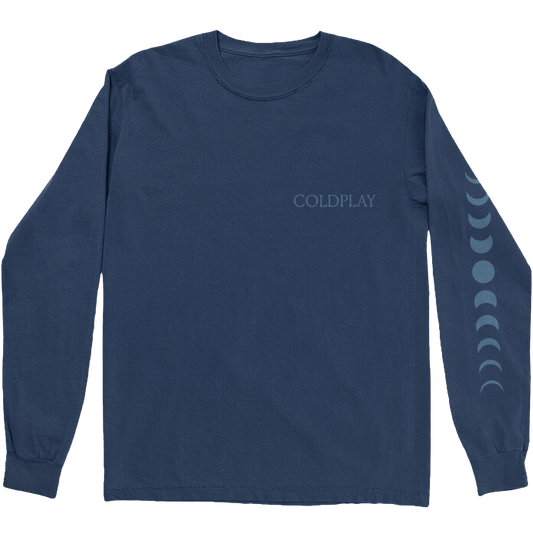 Front: COLDPLAY is printed on the chest, in light blue in a serif-style. On the left sleeve, an 11-phase moon cycle is arranged vertically, from waxing crescent to full moon, back to waning crescent. The full moon is in the center. The shirt is blue.
