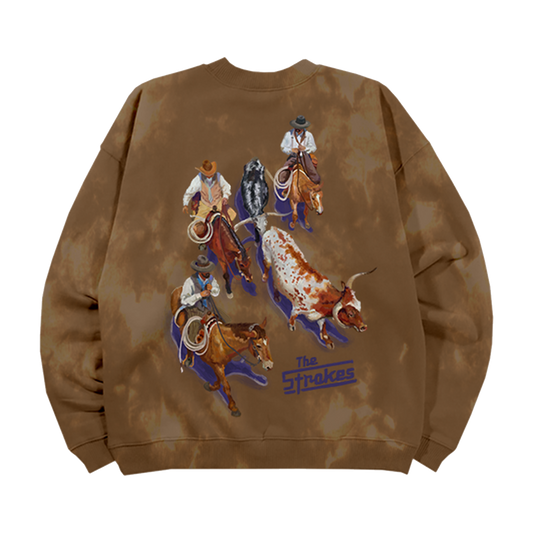 The Back of a Brown Tie-Dye Crewneck featuring a western cattle drive scene graphic with a Blue The Strokes Logo.