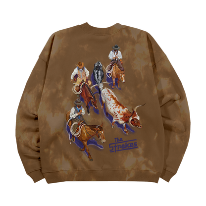 The Back of a Brown Tie-Dye  Crewneck featuring a western cattle drive scene graphic with a Blue The Strokes Logo. 