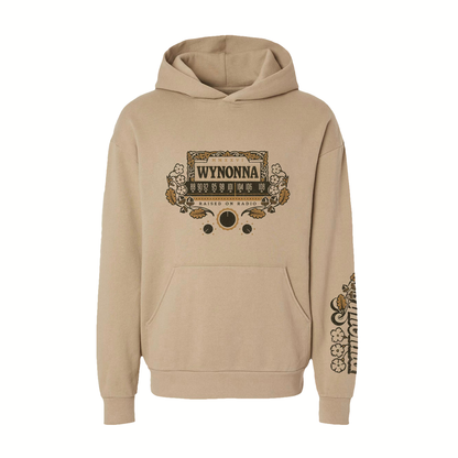 Mid-weight unisex pullover hoodie in tan featuring a Wynonna Raised On Radio design printed on the front and Raised On Radio 2026 tour dates on the back.