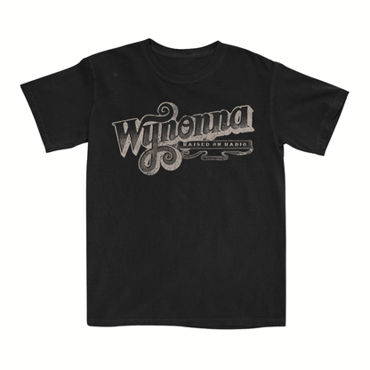 Classic fitting unisex tee in black featuring a Wynonna Raised On Radio design printed on the front.
