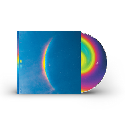 2: CD case: The artwork features a centered??with a large, arced rainbow light dispersion to the left. The colors flow from red to orange, yellow, green, light&dark blue, on a blue night sky filled with stars. An11face moon cycle is arranged vertically, from??to full moon in the center, back to??Moon Music&Coldplay are written in light blue on the left. A Parlophone Records logo is also visible. On the disc itself, the center label has a radiant spiral, drawn with blue, pink, purple, yellow&green shades.