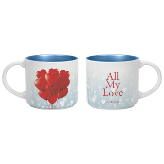 2-side view of a White ceramic mug, with a glossy blue interior. One side of the mug has a bouquet of red heart-shaped balloons tied with strings, floating upwards towards a light blue background, as if they were filled with helium. The other has All My Love&Coldplay in bold red font. Throughout the whole surface of the cup are hand-drawn white hearts, crescent moons, infinity signs&rainbow doodles from Chris’s studio notebook. Some hearts are outlines, some are filled in. The mug has a white handle.