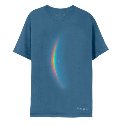 Front: features the album artwork crescent moon in the center of the blue shirt, with a large, arced rainbow light dispersion to the right. The colors created by the light dispersion flow from red to orange, yellow, green, light and dark blue. At the left hip, MOON MUSIC is printed in white in Chris’s handwritten style.