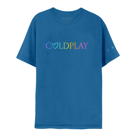 Front: COLDPLAY written on chest in a color gradient. A hand-drawn heart makes the letter O; C is purple, O is light blue, L is green, D green to yellow, P is orange, L is dark orange, A is pink, Y is fuchsia. A purple heart, green infinity sign, orange circle and pink rainbow adorn the left sleeve. The shirt is blue.