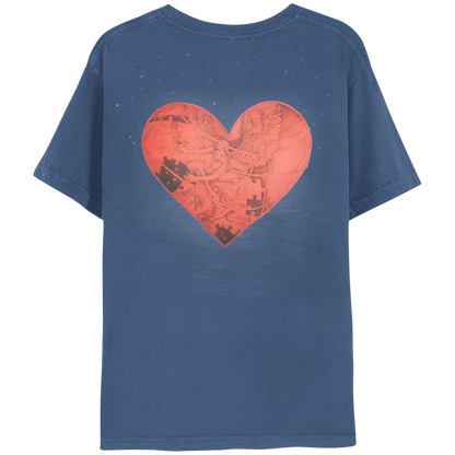 Back: a delicate etching that features a large red heart over a blue backdrop. An angel woman, with feathered wings spread wide, puts together a giant jigsaw puzzle, composed of pictures of a lighthouse, a man pulling a woman up from the ground, a staircase, and some fish floating around. The drawing is monochromatic, using variations of red to create depth and detail. The background of the shirt has small white specks around the heart, resembling tiny stars.