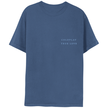 Front: Blue shirt, with the words COLDPLAY, TRUE LOVE on the left side of the chest. The text is in a slightly lighter blue color than the fabric. TRUE LOVE is directly below COLDPLAY. All text is capitalized.